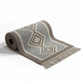 Woven area rug in grey and brown geometric pattern 150 x 100 x 2cm